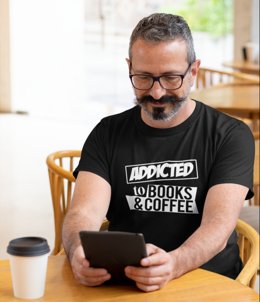 t shirt mockup featuring a man reading at a cafe 31712